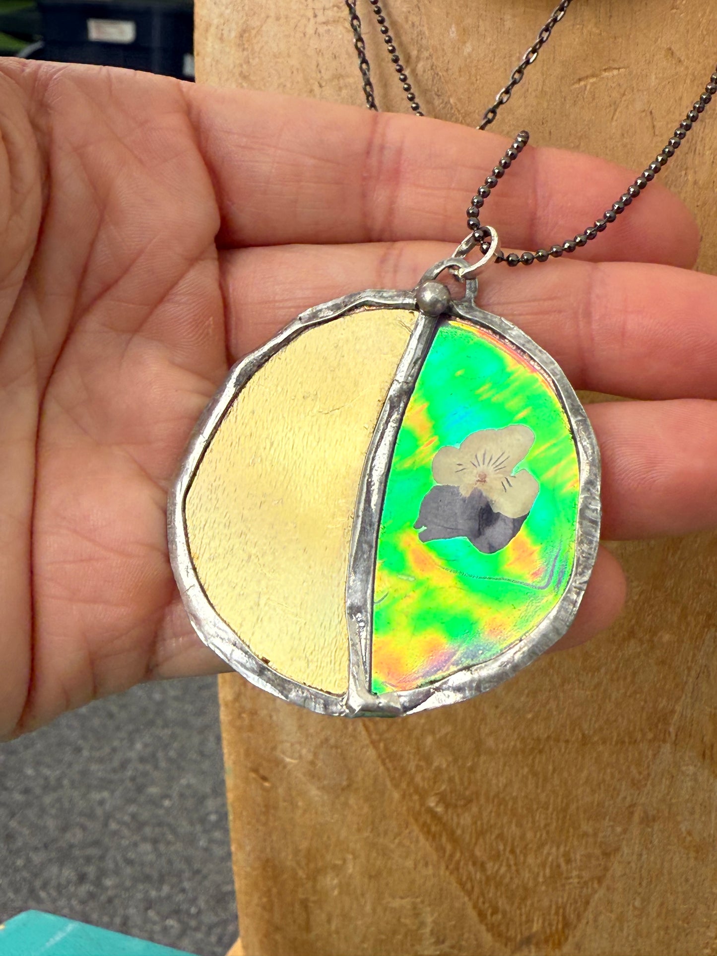 🌙 “Celestial Bloom” Necklace – Pressed Pansy on Iridescent Resins with Golden Moon