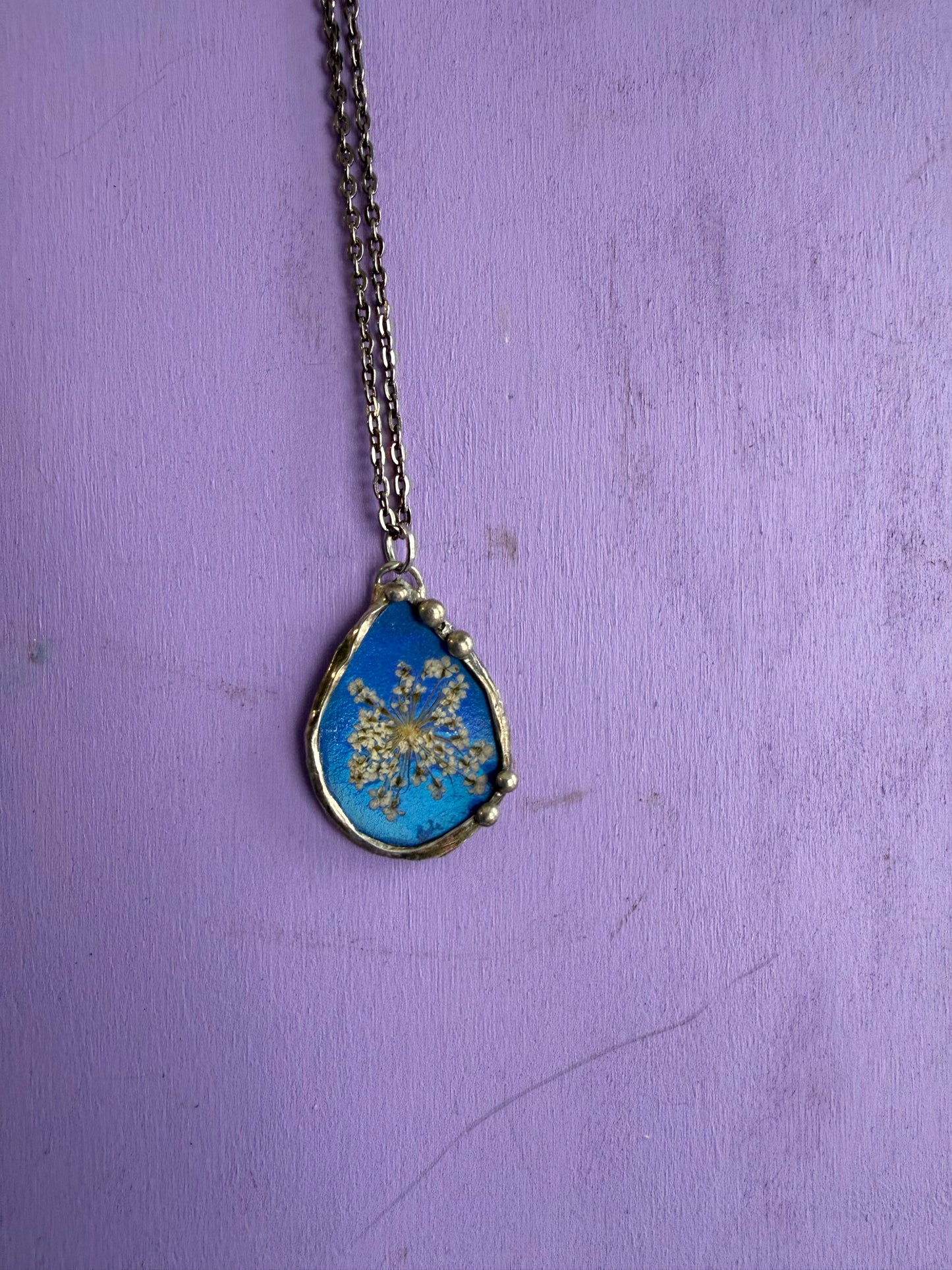 Queen Anne’s Lace Flower Necklace with Shiny Blue Background