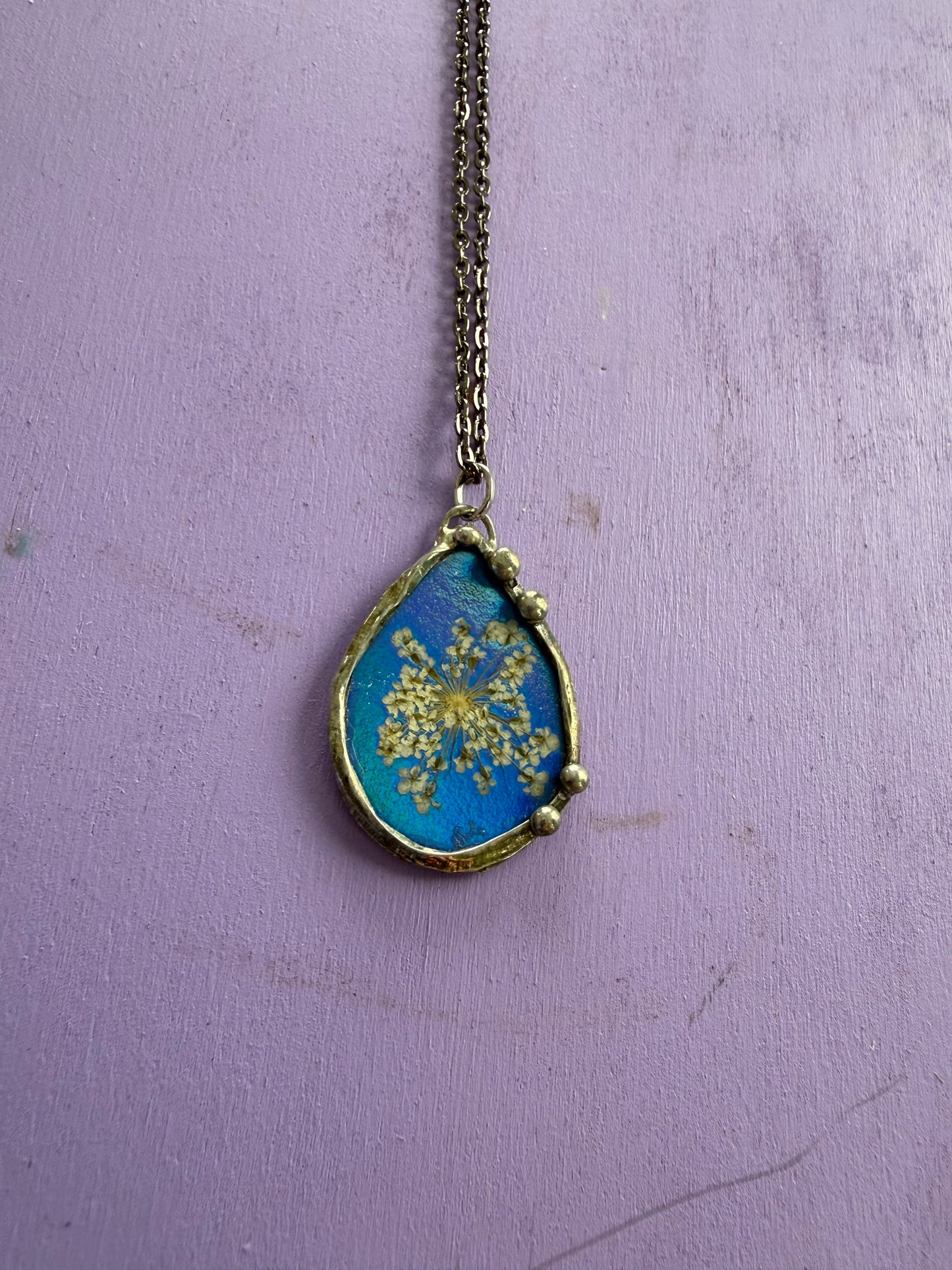 Queen Anne’s Lace Flower Necklace with Shiny Blue Background